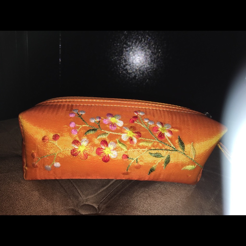 Silk embroidery cosmetic pouch